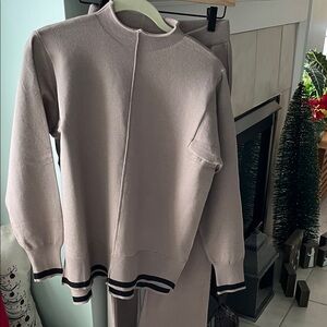 Women's Taupe with black trim.Sweater and pants set